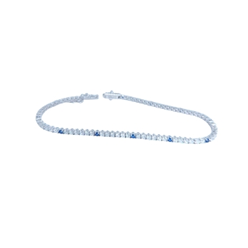 Riviere bracelet in 18K white gold with 2.05ct sapphires and 3.43ct zircons. Elegant, luminous, and 7.5g in weight.