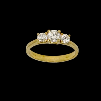 Timeless trilogy ring in 18K gold featuring lab diamonds totalling 0.57ct. Classic brilliance with graceful weight of 2.7g.