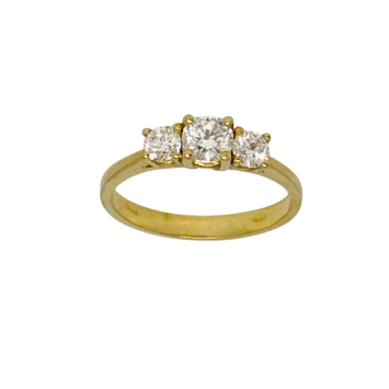 Timeless trilogy ring in 18K gold featuring lab diamonds totalling 0.57ct. Classic brilliance with graceful weight of 2.7g.