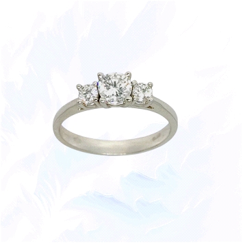 Trilogy ring in 18K white gold featuring lab diamonds: centre stone 0.45ct and sides totalling 0.24ct.