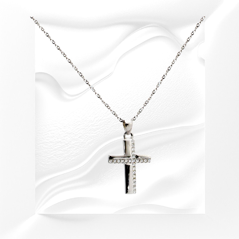925 silver cross necklace, rhodium plated, with zircon detailing. 18mm pendant, 45cm chain. Subtle shine.
