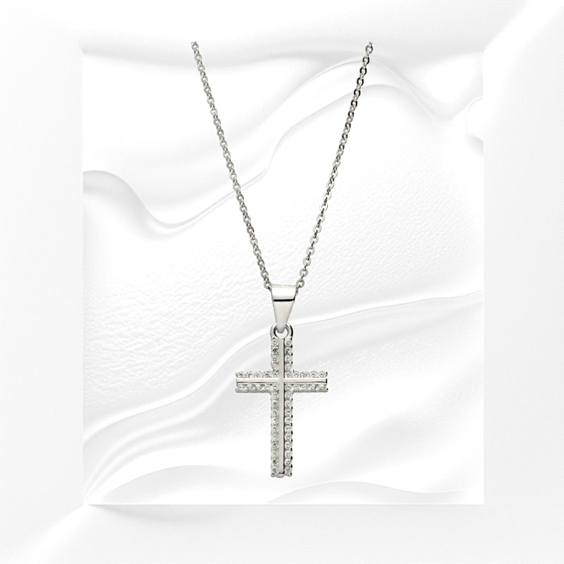 925 silver cross necklace, rhodium plated, with zircon detailing. 18mm pendant, 45cm chain. Subtle shine, durable finish.