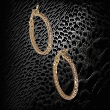 Stylish unisex hoop earrings crafted in radiant 18K yellow gold, featuring sparkling zircon accents. Lightweight at 2g for every