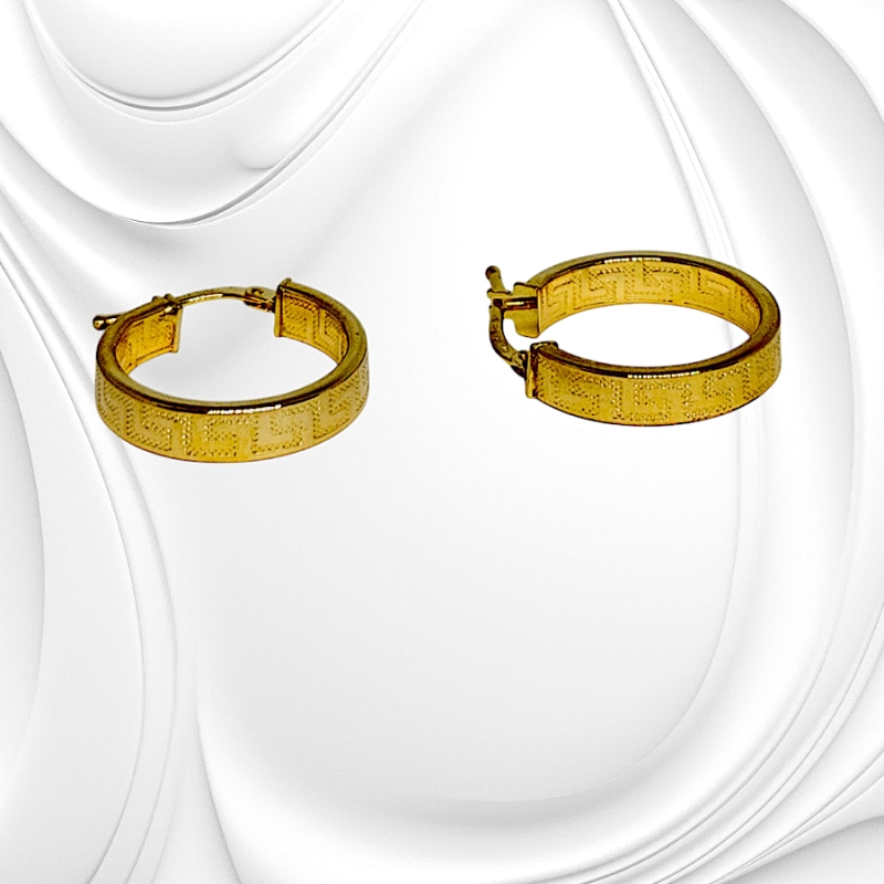 18K gold hoop earrings with Greek-inspired engraving. 4mm wide, 15mm diameter. Weight: 1.48g. Elegant latch-back closure. 18K gold hoop earrings with Greek-inspired engraving. 4mm wide, 15mm diameter. Weight: 1.48g. Elegant latch-back closure.