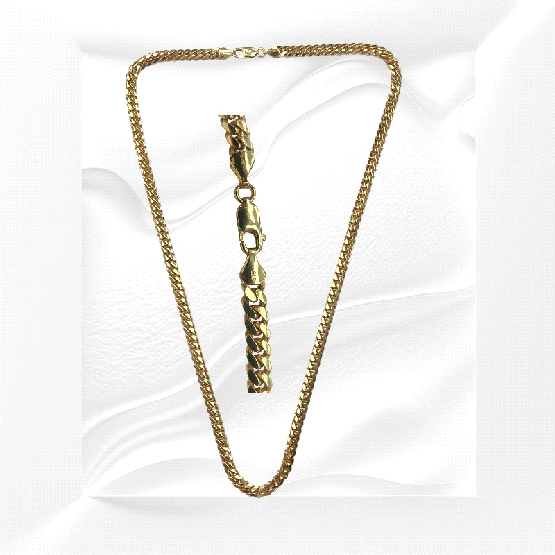 9K gold Cuban link chain, 5mm wide, 60cm long, 52.32g. Features a polished lobster clasp for secure wear.