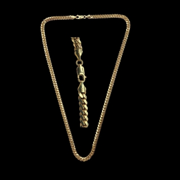 9K gold Cuban link chain, 5mm wide, 60cm long, 52.32g. Features a polished lobster clasp for secure wear.
