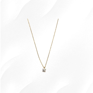 9K yellow gold necklace with 0.5ct zircon solitaire pendant. Weight: 1.5g