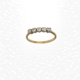 9K yellow gold ring with five round-cut zircon stones. Weight: 1.3g.