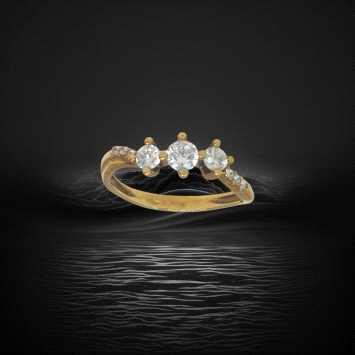 9K yellow gold ring with central zircon trio and side stones. Weight: 2.0g
