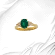 18K yellow gold ring with 1.21ct oval emerald and six diamonds. Weight: 0.15ct total.