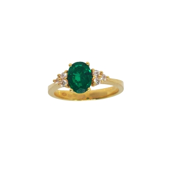 18K yellow gold ring with 1.21ct oval emerald and six diamonds. Weight: 0.15ct total.